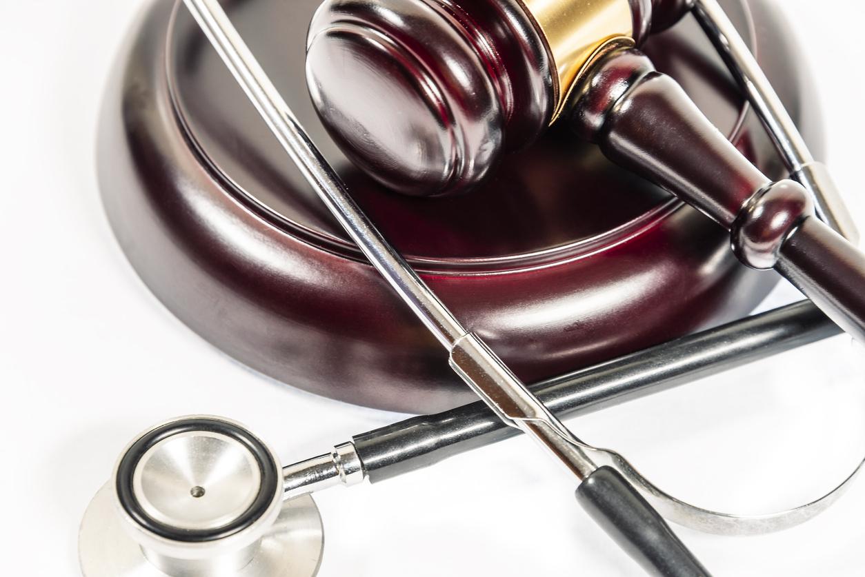 SSD Physical Disabilities for Disability Benefits Buffalo, NY. Judge's gavel and stethoscope.