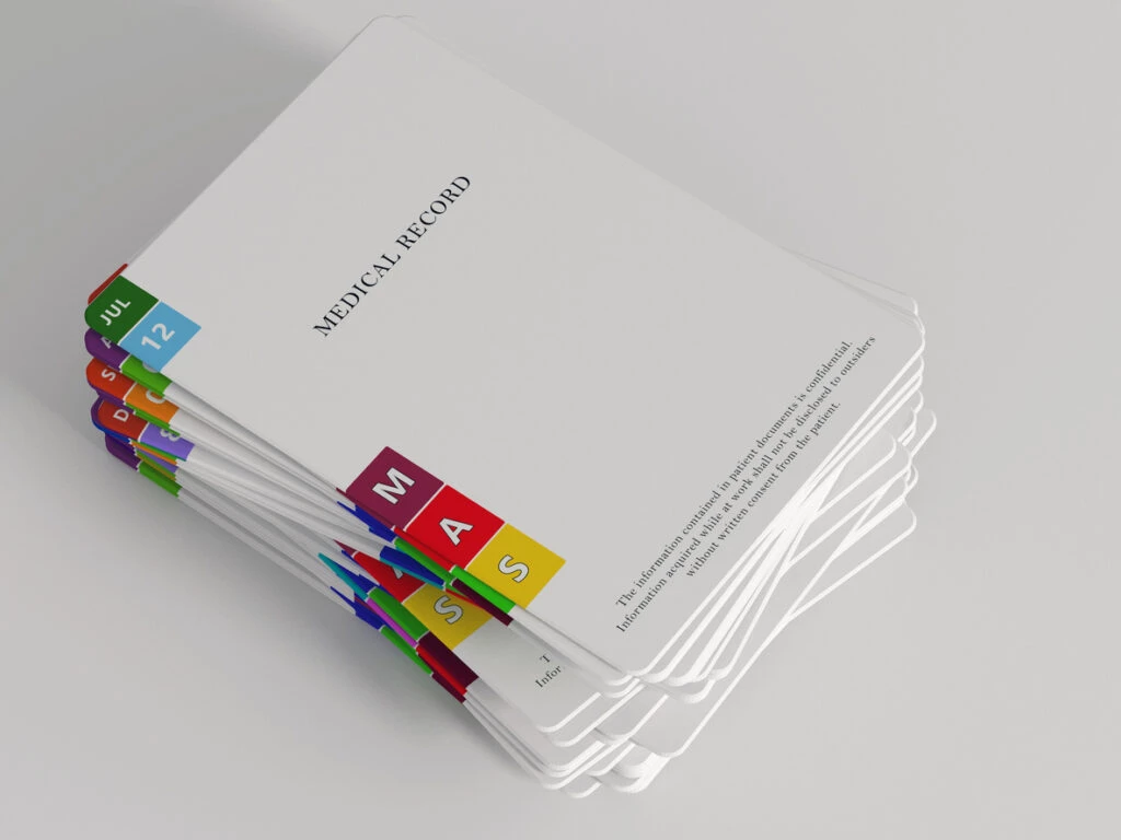 File folders stuffed with medical records stacked in a pile